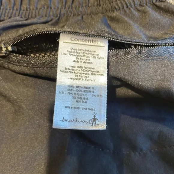 Smartwool PhD black tennis skirt with interior wool shorts Large