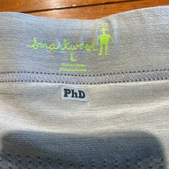 Smartwool PhD black tennis skirt with interior wool shorts Large